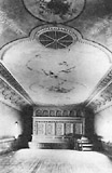 painted ceiling mural and elaborate organ screen