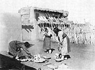 women firing pottery