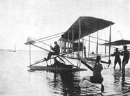 Curtiss and his crew prepare a hydroaeroplane for flight