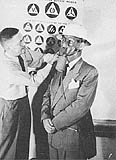 gas mask being modelled by Patrolman Ken Blucher